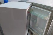 冰柜门结冰无法打开的解决方法（冰柜门结冰导致无法打开？不要慌）