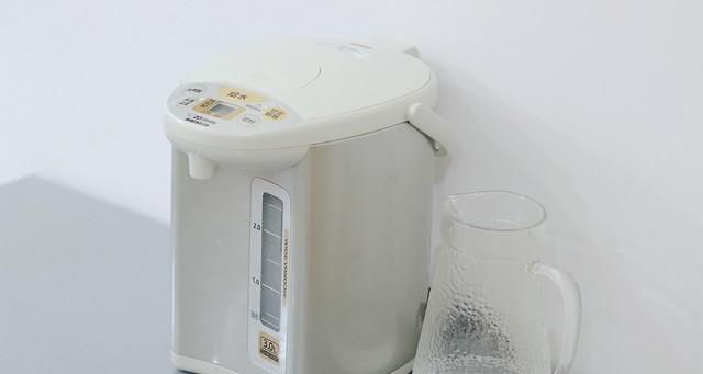 解决饮水机无法容纳大型水壶的问题（如何应对大型水壶放不下的尴尬情况）
